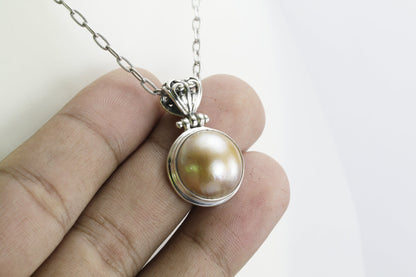 Beautiful Round 17 mm Golden Mabe Pearl bezel set in handmade dangling necklace pendant 925 sterling silver Decorated with filigree bale
