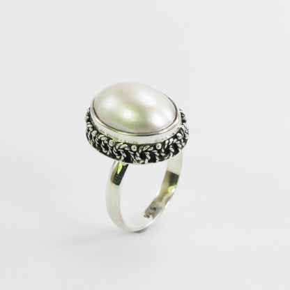mabe pearl ring 925 sterling silver oval shape  17*14 mm decorated with swirl crown filigree ornament