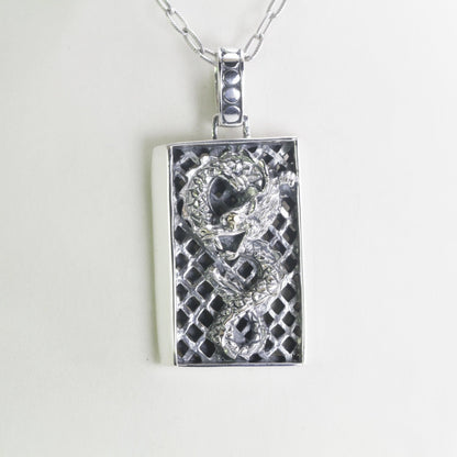 silver dragon necklace pendant decorated with 18K yellow gold on the eye, dragon pendant silver
