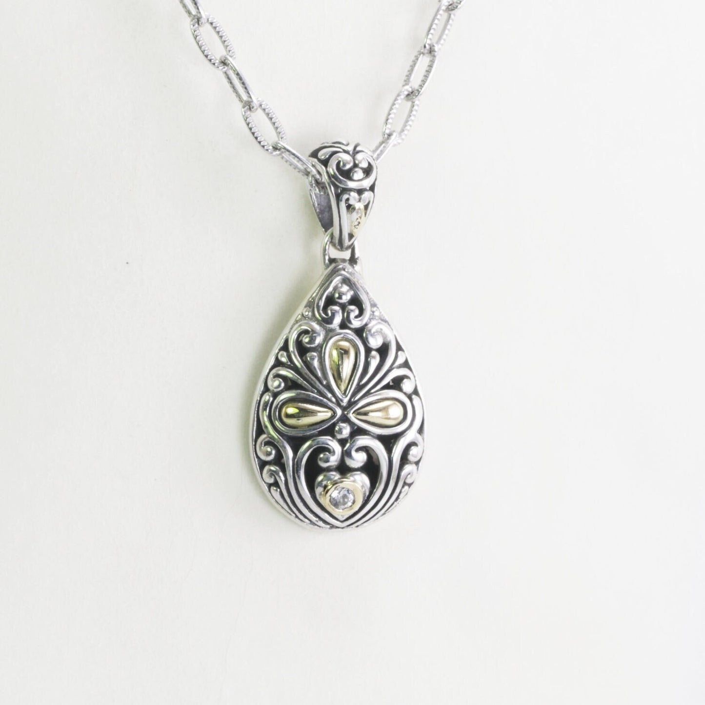 Tear drop pendant necklace 925 sterling silver decorated with 18K gold accent and open work ornament art