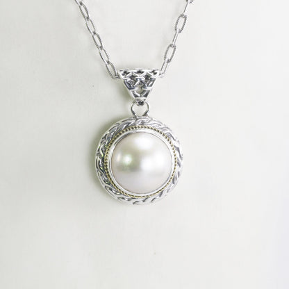 Mabe pearl pendant set in 925 sterling silver decorated with 18K Real gold cable style