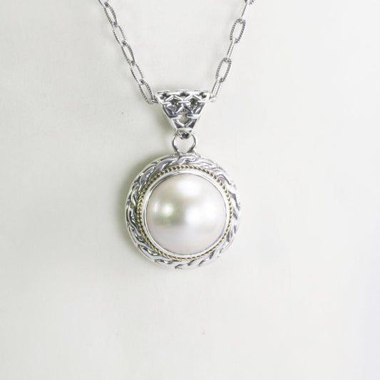 Mabe pearl pendant set in 925 sterling silver decorated with 18K Real gold cable style