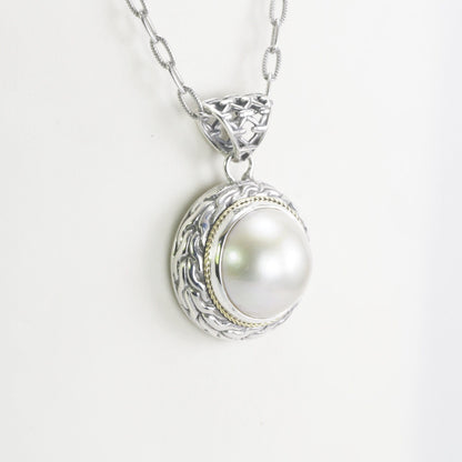 Mabe pearl pendant set in 925 sterling silver decorated with 18K Real gold cable style