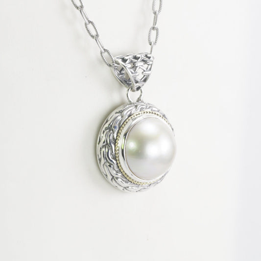 Mabe pearl pendant set in 925 sterling silver decorated with 18K Real gold cable style