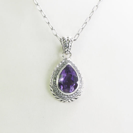 amethyst pendant tear drop set in 925 sterling silver decorated with white topaz pave