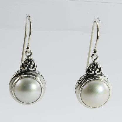 mabe pearl earrings set in 925 sterling silver decorated with filigree ornament