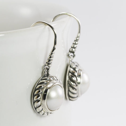 white mabe pearl earrings set in 925 sterling silver 12mm round decorated with cable ornament