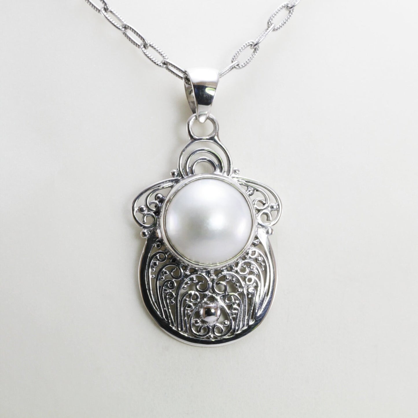 white mabe pearl pendant necklace 925 sterling silver decorated with filigree ornament