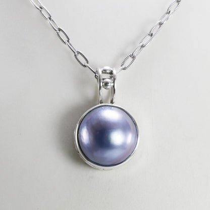 blue mabe pearl pendant necklace 925 sterling silver decorated with filigree ornament