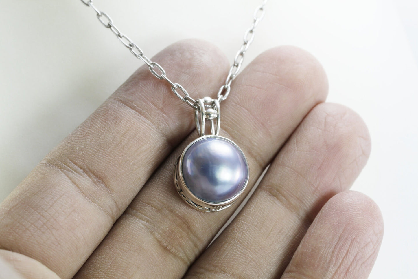 blue mabe pearl pendant necklace 925 sterling silver decorated with filigree ornament