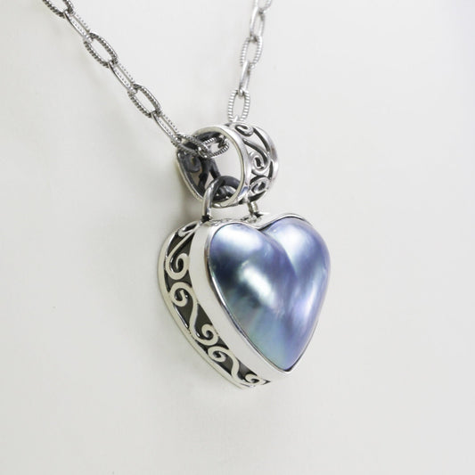blue mabe pearl pendant necklace heart shape set in 925 sterling silver decorated with ornament