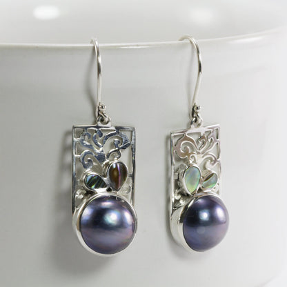 white mabe pearl earrings set in 925 sterling silver decorated with created opal and ornament filigree
