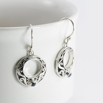 circle earrings with genuine swiss blue topaz set in 925 sterling silver decorated with Bali swirl filigree ornament