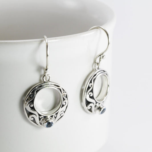 circle earrings with genuine swiss blue topaz set in 925 sterling silver decorated with Bali swirl filigree ornament