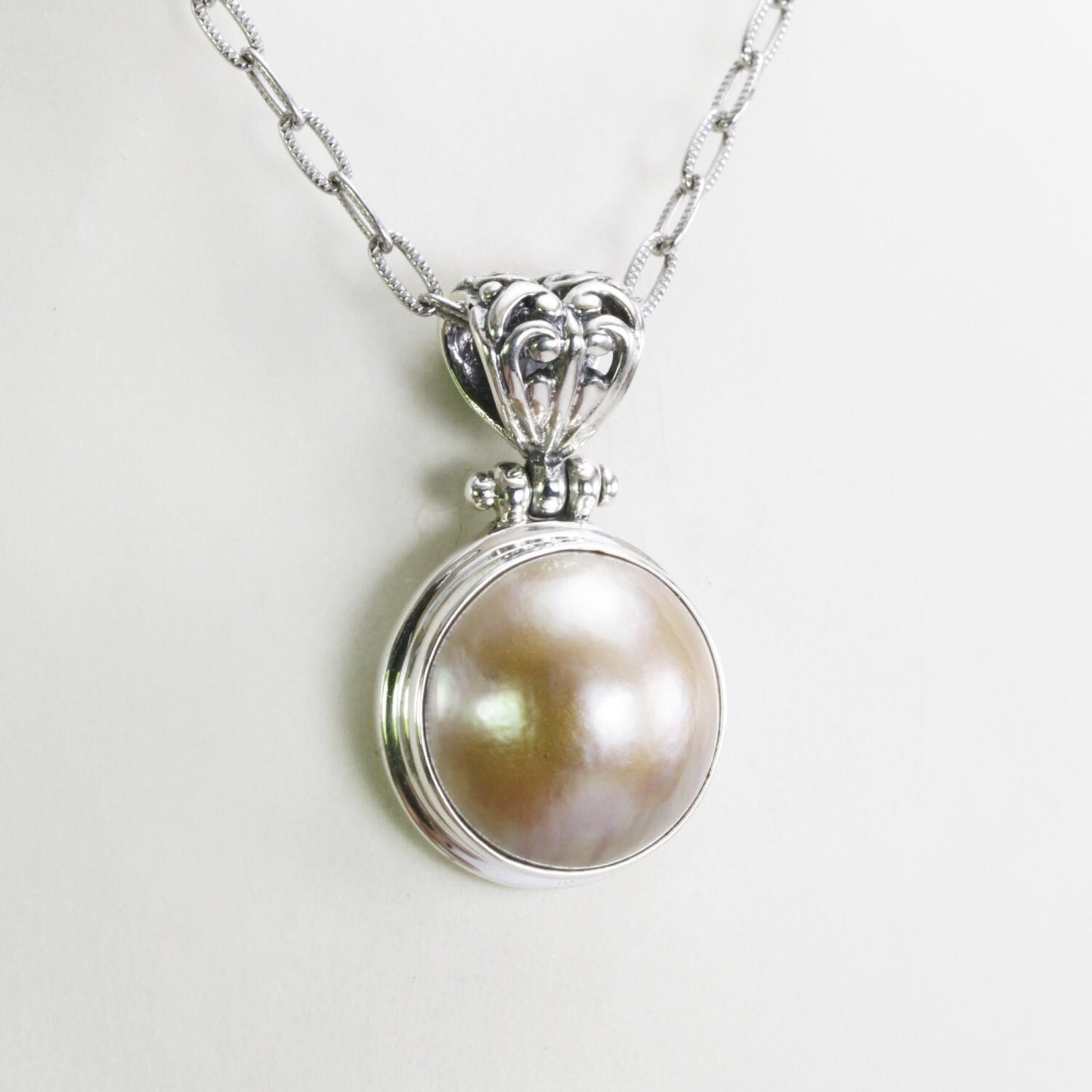 Beautiful Round 17 mm Golden Mabe Pearl bezel set in handmade dangling necklace pendant 925 sterling silver Decorated with filigree bale