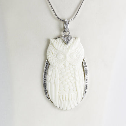 Owl Pendant necklace bone carving decorated with white topaz set in 925 sterling silver