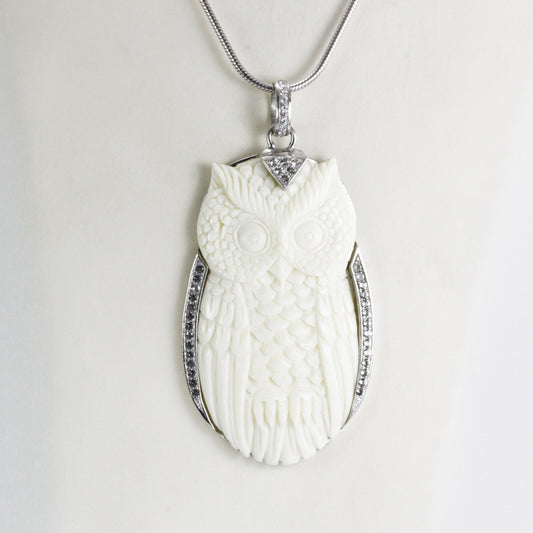 Owl Pendant necklace bone carving decorated with white topaz set in 925 sterling silver