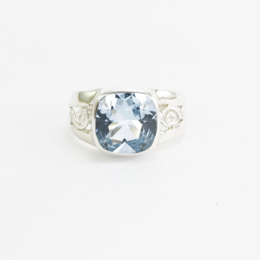 Split Shank ring with genuine cushion cut blue topaz set in 925 sterling silver bezel set