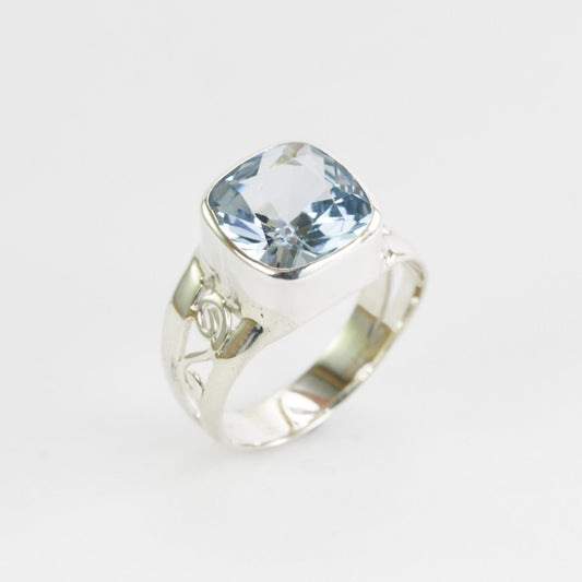 Split Shank ring with genuine cushion cut blue topaz set in 925 sterling silver bezel set