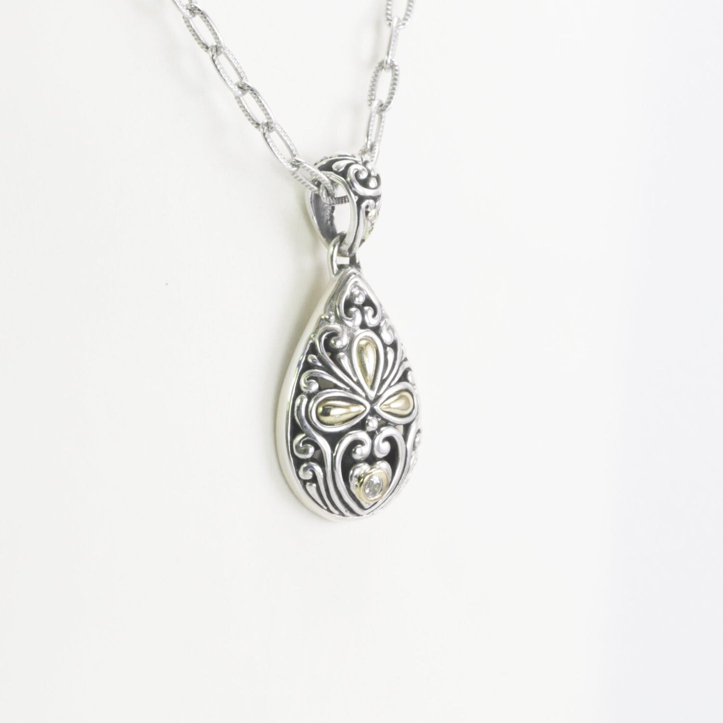 Tear drop pendant necklace 925 sterling silver decorated with 18K gold accent and open work ornament art