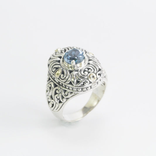 blue topaz ring 925 sterling silver decorated with filigree ornament and 18 K yellow gold