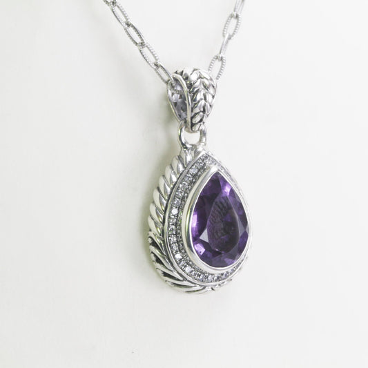 amethyst pendant tear drop set in 925 sterling silver decorated with white topaz pave