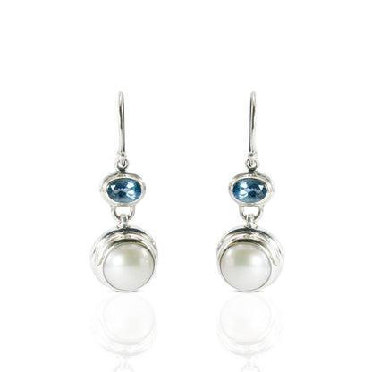 freshwater pearl earrings set in 925 sterling silver with genuine blue topaz