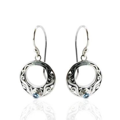 circle earrings with genuine swiss blue topaz set in 925 sterling silver decorated with Bali swirl filigree ornament