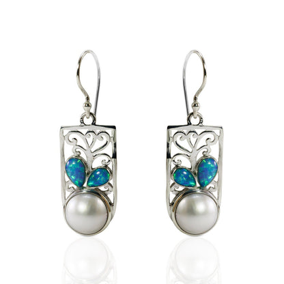 white mabe pearl earrings set in 925 sterling silver decorated with created opal and ornament filigree