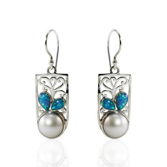 white mabe pearl earrings set in 925 sterling silver decorated with created opal and ornament filigree