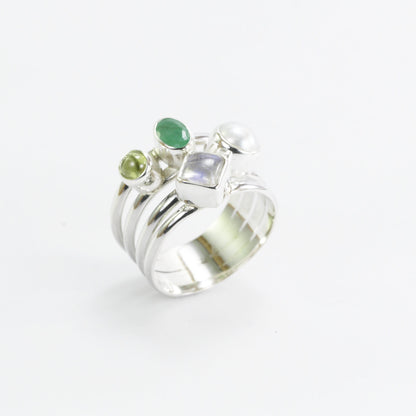 multi stone ring with emerald, peridot, moonstone, and fresh water pearl set in 925 sterling silver