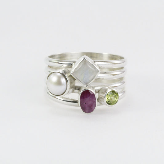 multi stone ring with ruby, peridot, moonstone, and fresh water pearl set in 925 sterling silver