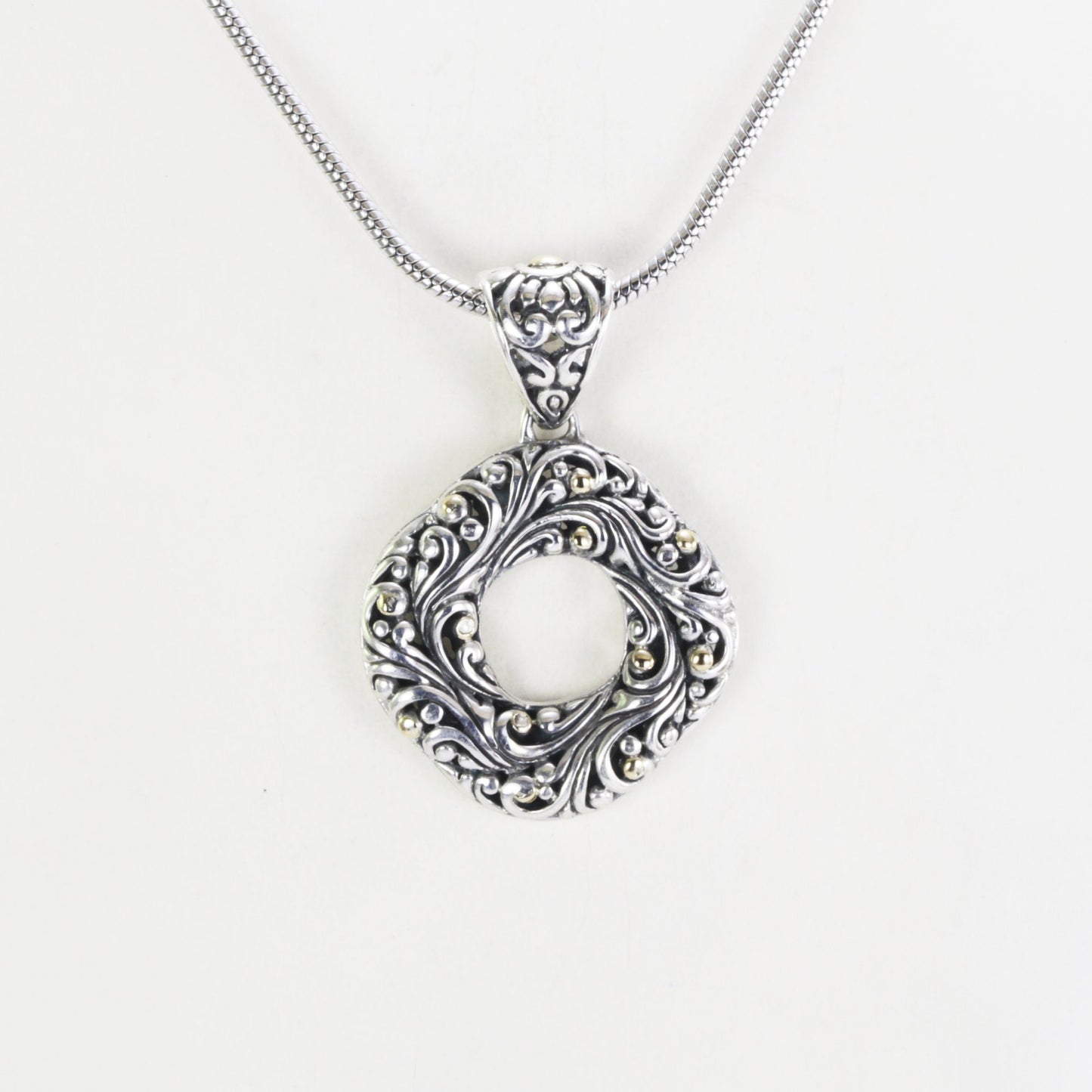 infinity pendant with open work filigree ornament in 925 sterling silver and 18k Yellow gold accent,