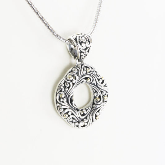 infinity pendant with open work filigree ornament in 925 sterling silver and 18k Yellow gold accent,