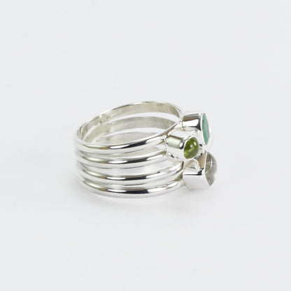 multi stone ring with emerald, peridot, moonstone, and fresh water pearl set in 925 sterling silver