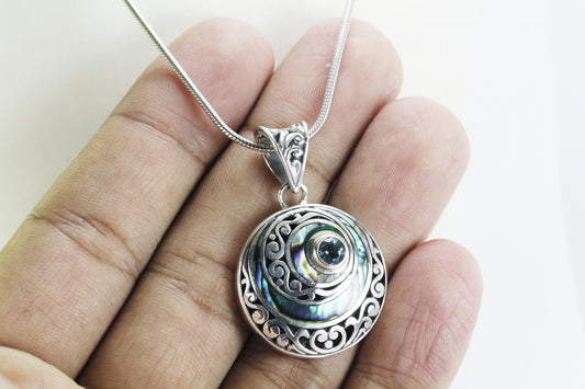 circle pendant necklace with genuine abalone shell and blue topaz set in 925 sterling silver