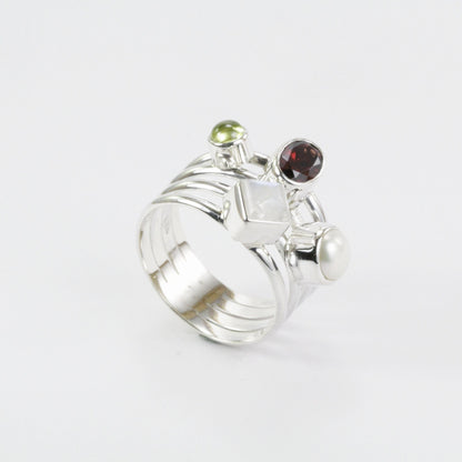 Multi color stone ring with garnet, peridot, moonstone, and fresh water pearl set in 925 sterling silver