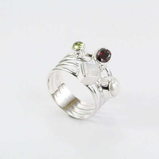 Multi color stone ring with garnet, peridot, moonstone, and fresh water pearl set in 925 sterling silver
