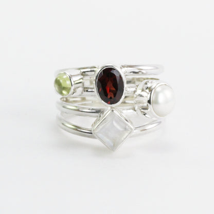 Multi color stone ring with garnet, peridot, moonstone, and fresh water pearl set in 925 sterling silver