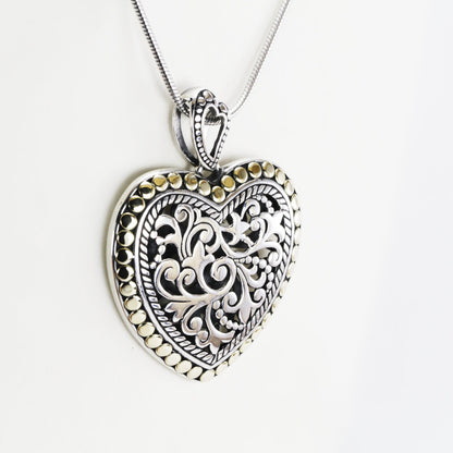 Heart shape pendant necklace 925 sterling silver decorated with open work royal filigree and 18K gold accent