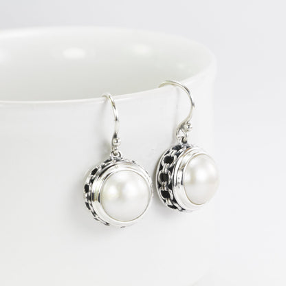 Mabe pearl earrings round dangle 925 sterling silver decorated with chain carving edge