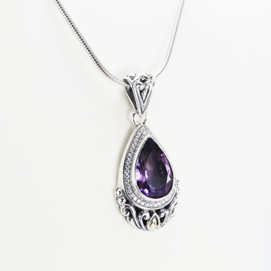 Teardrop amethyst pendant necklace set in 925 sterling silver decorated with 18K yellow gold and white topaz