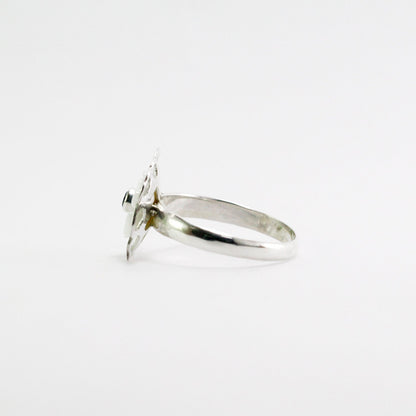 flower ring 925 sterling silver decorated with white shell and genuine blue topaz