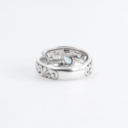 open work ring with genuine blue topaz in 925 sterling silver