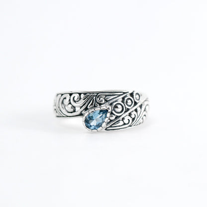 open work ring with genuine blue topaz in 925 sterling silver