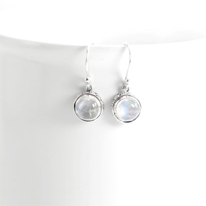 Moonstone earrings set in 925 sterling silver round dangle decorated with filigree edge