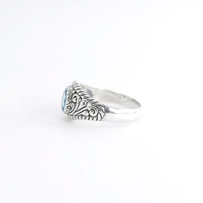 open work ring with genuine Oval blue topaz in 925 sterling silver, cable style ring