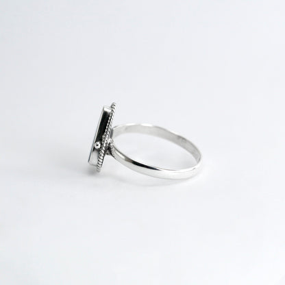 Fire Opal ring 925 sterling silver bezel set decorated with cable edge