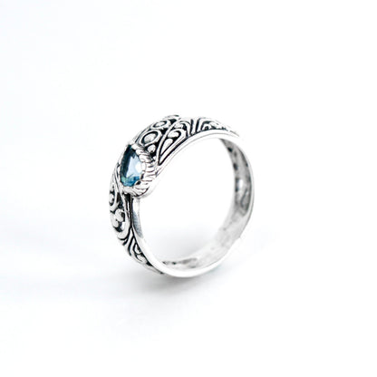 open work ring with genuine blue topaz in 925 sterling silver