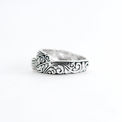 open work ring with genuine blue topaz in 925 sterling silver